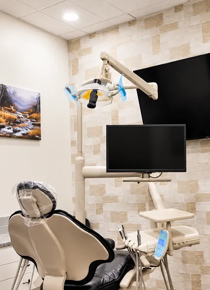 A treatment room with a dental chair